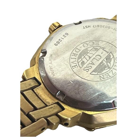 Citizen Eco-Drive Diamond Bezel Gold Tone Day Date Spanish WR100 Watch Works main image 4